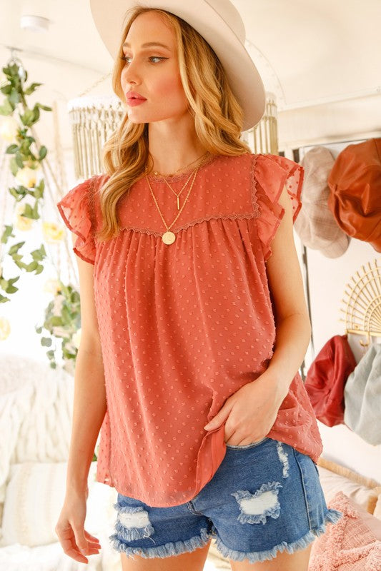 burnt orange polka dot top